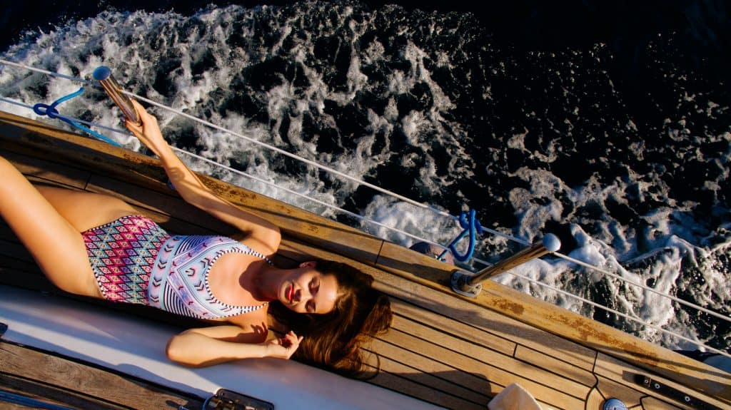 luxury woman yachting in sea top view